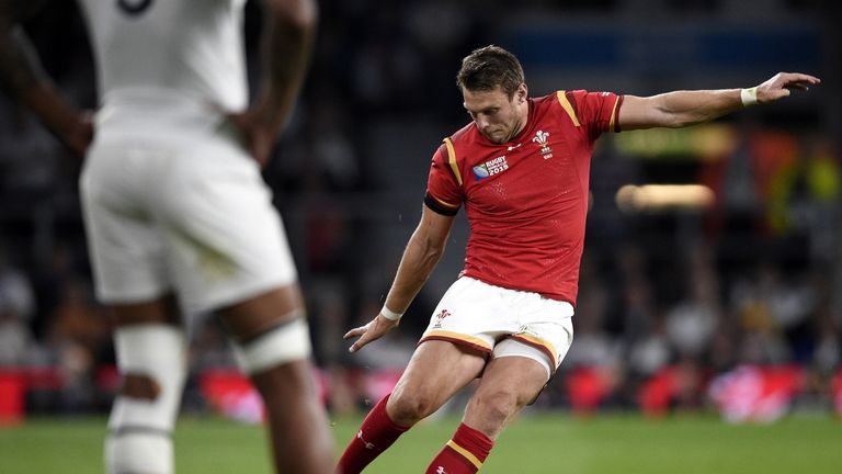 Wales' fly half Dan Biggar kicks the ball  during a Pool A match of the 2015 Rugby World Cup between England and Wales at Twickenham stadium, south wes