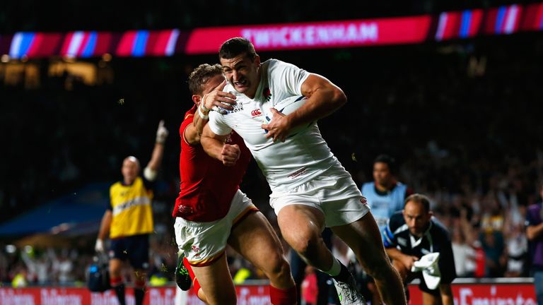 LONDON, ENGLAND - SEPTEMBER 26:  Jonny May of England runs in to score their first try during the 2015 Rugby World Cup Pool A match between England and Wal