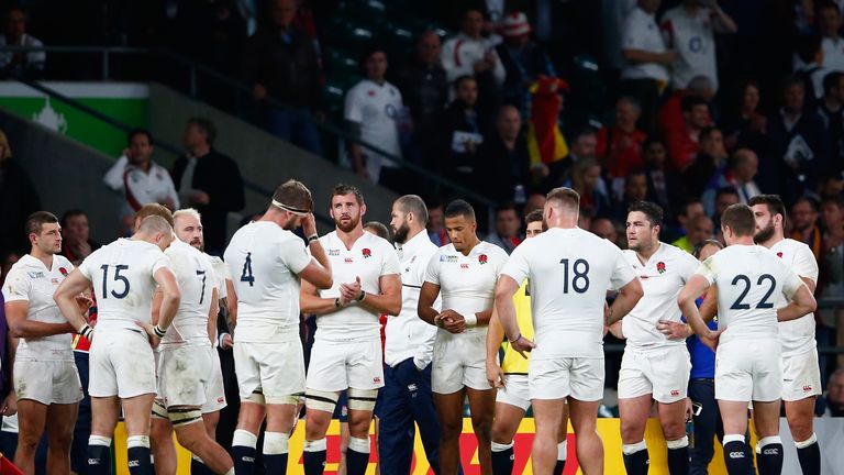 LONDON, ENGLAND - SEPTEMBER 26:  England players look dejected in defeat after the 2015 Rugby World Cup Pool A match between England and Wales at Twickenha