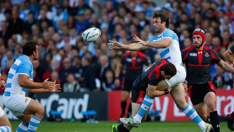 GLOUCESTER, ENGLAND - SEPTEMBER 25:  Marcelo Bosch of Argentina releases the ball as he is tackled by Vasil Lobzhanidze of Georgia during the 2015 Rugby Wo