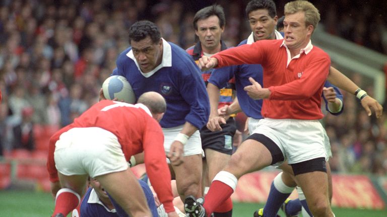 Western Samoa's captain Peter Fatialofa drives into Wales' Richie Collins during the 1991 World Cup