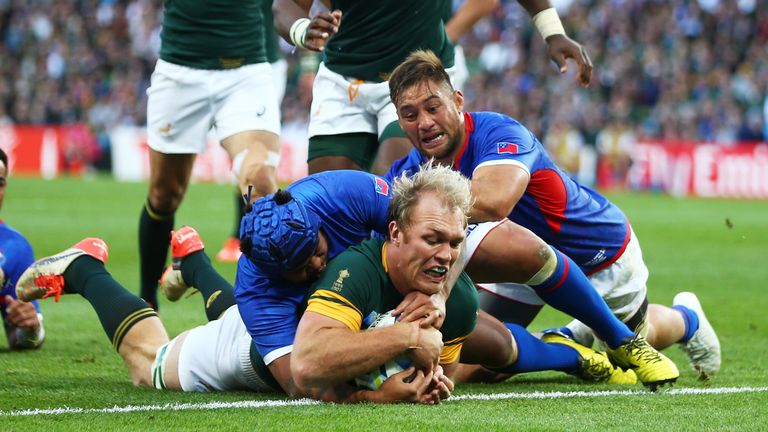 Schalk Burger of South Africa goes over to score his teams third try during the 2015 Rugby World Cup Pool B match betw