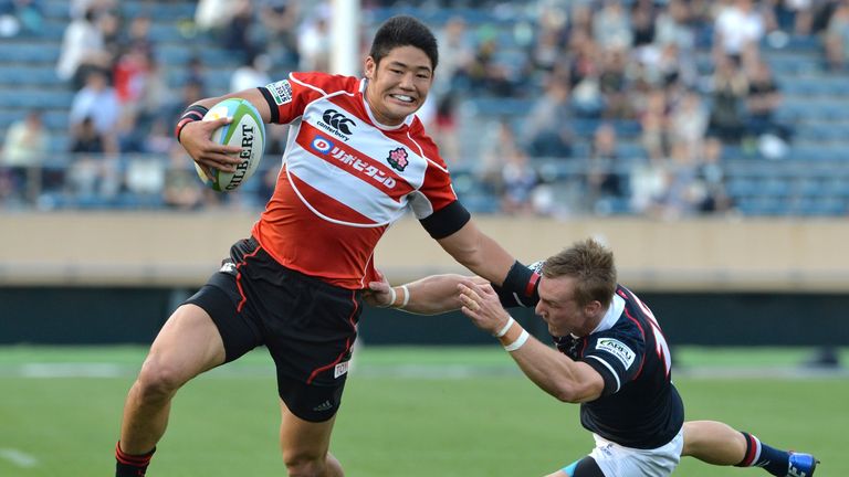 Japan's Yoshikazu Fujita scores a try against Hong Kong in last year's Asia Five Nations