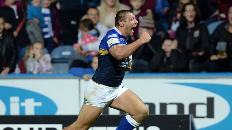 Leeds' Ryan Hall runs in to score his side's winning try in the last minute of their clash at Huddersfield in Super League's Super 8s