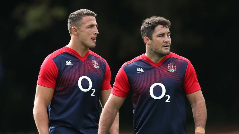 England's centre pairing of Sam Burgess (L) and Brad Barritt look on during the team's training session