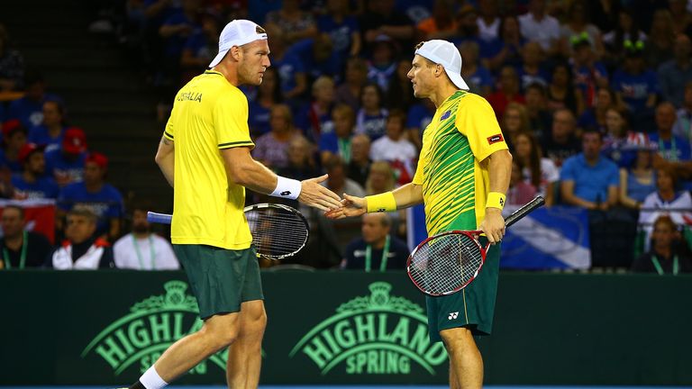 Samuel Groth of Australia celebrates a point with Lleyton Hewitt (R) during Day Two of the Davis Cup Semi Final match be