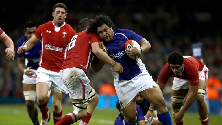 Samoa's Census Johnston is tackled by Ryan Jones of Wales during the international match between the sides at the Millennium Stadium on November 16, 2012.