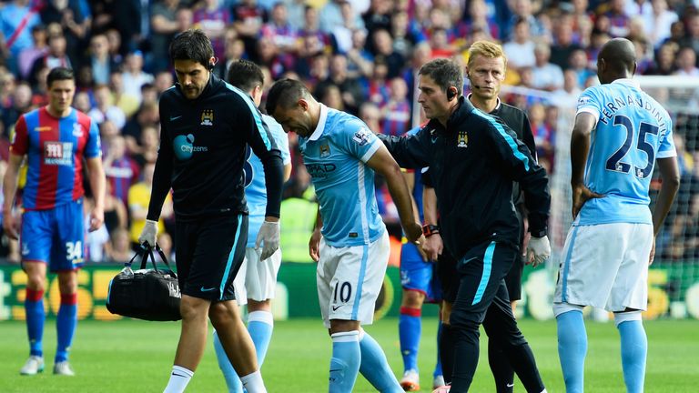 Sergio Aguero of Manchester City leaves the field injured against Crystal Palace