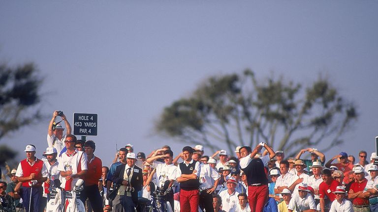 27 Sep 1991:  Seve Ballesteros tees off on the 4th hole watched by European team partner Jose Maria Olazabal and USA team pairing Paul Azinger and Chip Bec