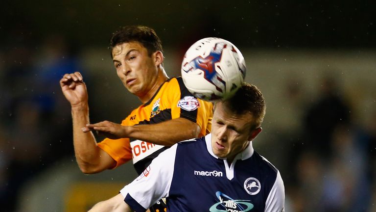 Shane Ferguson (right) will now stay at Millwall on loan from Newcastle until January