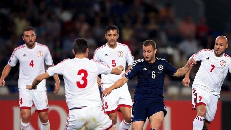 Scotland's Shaun Maloney and Georgia's Solomon Kverkvelia 