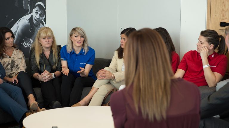 Ennis-Hill engages with the Sky Academy Sports Scholars and some of their parents