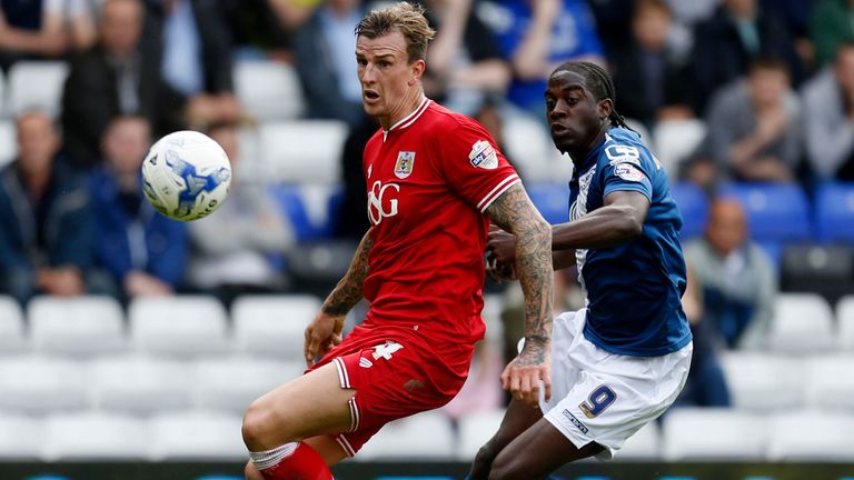 Aden Flint and Clayton Donaldson keep their eyes on the ball
