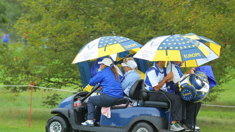 Members of the European Team leave the course for a break during the afternoon fourball matches on day one of the Solheim Cup