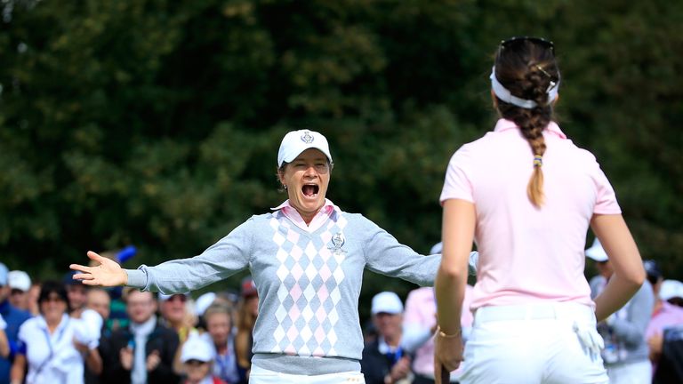 Catriona Matthew celebrates as teammate Sandra Gal holes short putt on 18 to win their match 1up