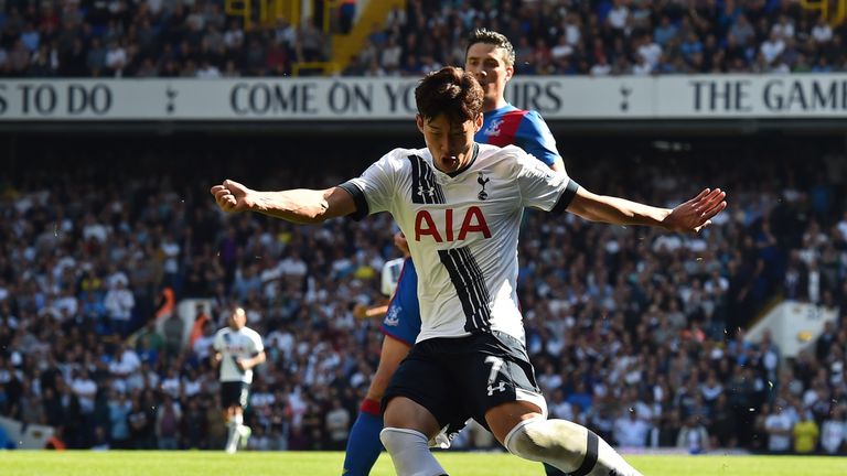 Son Heung-Min shoots to score the opening goal