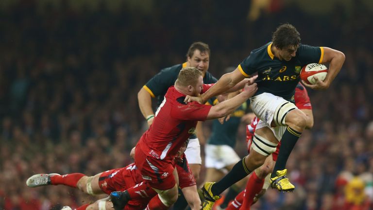  Eben Etzebeth (R) of South Africa  pulls away from Samson Lee of Wales during the International match betwwen Wales and South Africa