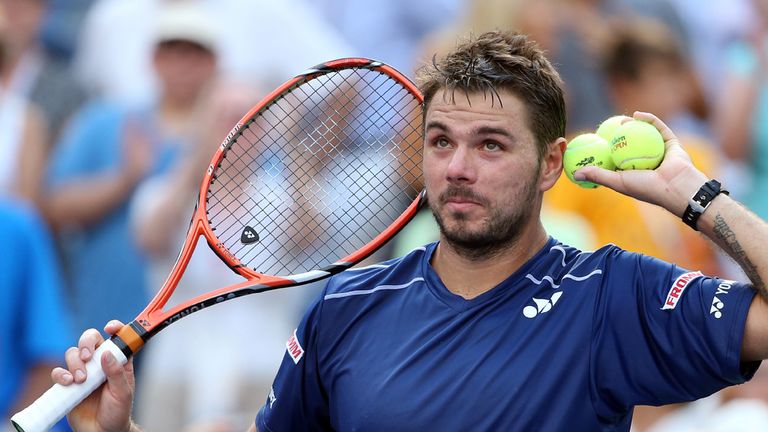 Stan Wawrinka of Switzerland celebrates after defeating Donald Young of the United States during their Men's Singles Fourth Round