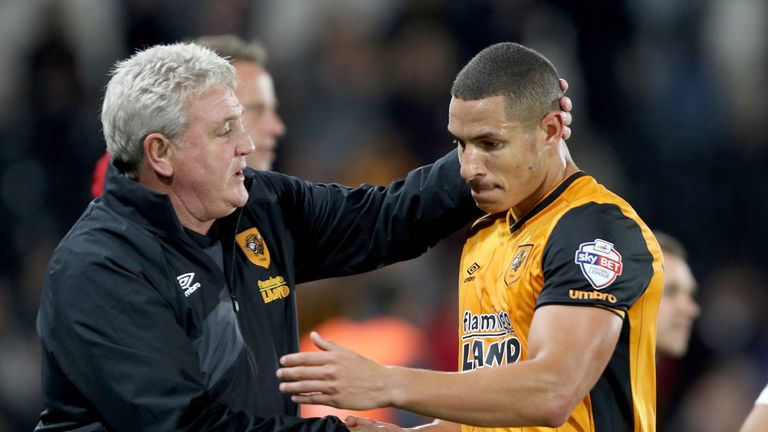 Hull City manager Steve Bruce with Jake Livermore during the Capital One Cup, third round match at the KC Stadium, Hull.