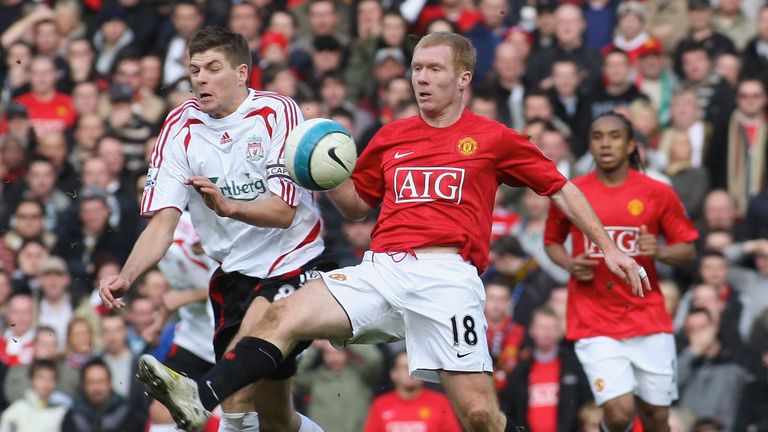  Paul Scholes of Manchester United clashes with Steven Gerrard of Liverpool during the Barclays FA Premier League match on March 23 2008