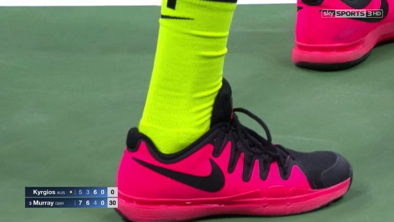 Nick Kyrgios in multi-coloured gear against Andy Murray at the US Open