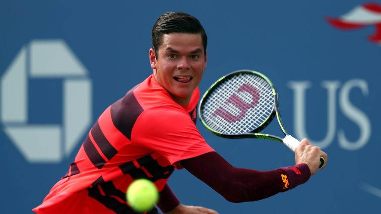 Milos Raonic return a shot against Tim Smyczek of the United States at the US Open