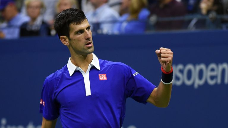 Novak Djokovic reacts after winning a set against Roger Federer  during their 2015 US Open Men's singles final