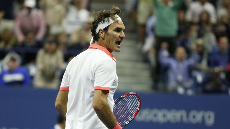Roger Federer celebrates a point while playing against Novak Djokovic during their US Open 2015 men's final