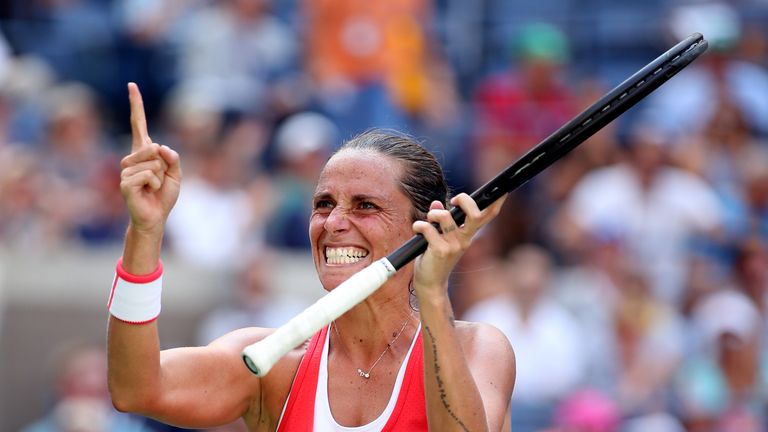 Roberta Vinci of Italy celebrates after defeating Kristina Mladenovic of France at the US Open