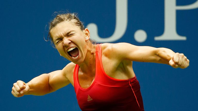 Simona Halep of Romania celebrates after defeating Victoria Azarenka of Belarus at the US Open