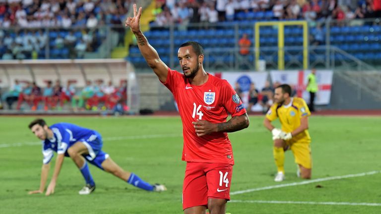 England's Theo Walcott celebrates after scoring 