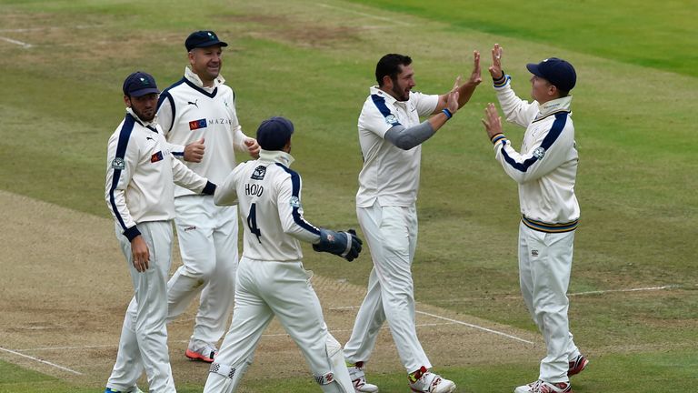 Tim Bresnan is congratulated after dismissed Sam Robson