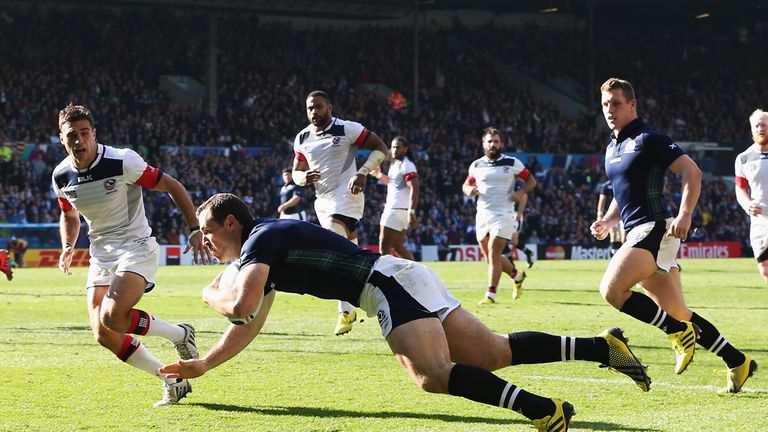 Tim Visser of Scotland scores his teams opening try during the 2015 Rugby World Cup Pool B match between Scotland and USA
