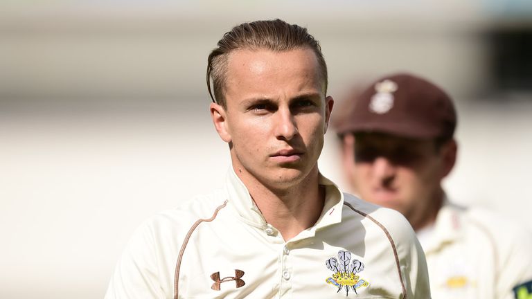 Surrey's Tom Curran walks off for lunch after taking four wickets during day three of the LV= County Championship match at The Kia Oval, London.