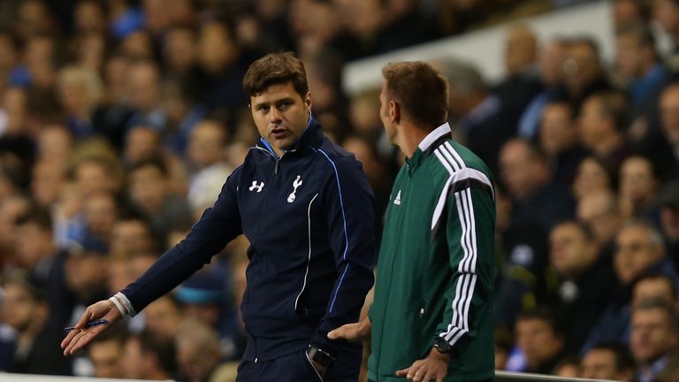 LONDON, ENGLAND - SEPTEMBER 17:  Mauricio Pochettino manager of Tottenham Hotspur speaks to fourth official during the UEFA Europa League Group J match bet