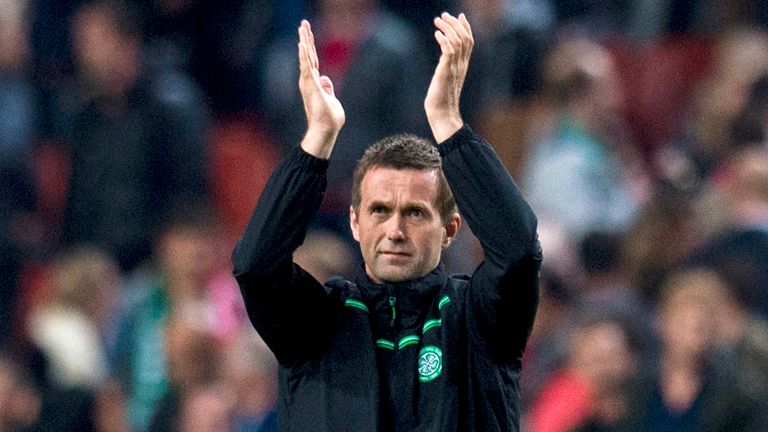 Celtic manager Ronny Deila applauds the fans at full-time