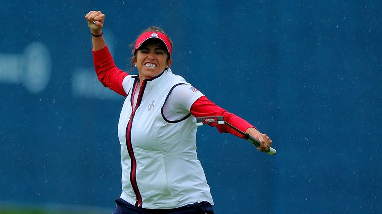 Gerina Piller of the United States Team celebrates at the 17th hole during the continuation of the afternoon fourballs