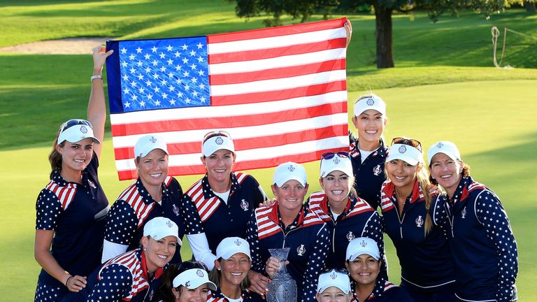 The United States team with the Solheim Cup after their victory on the final day.