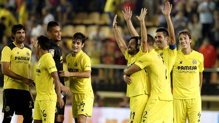 Villarreal's players celebrate their victory 