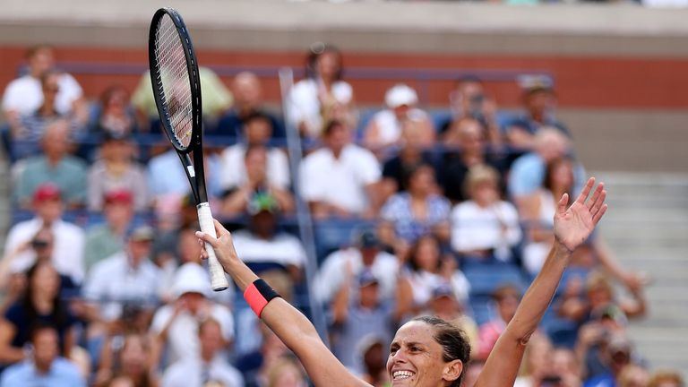 Vinci celebrates after pulling off one of the biggest shocks in tennis history