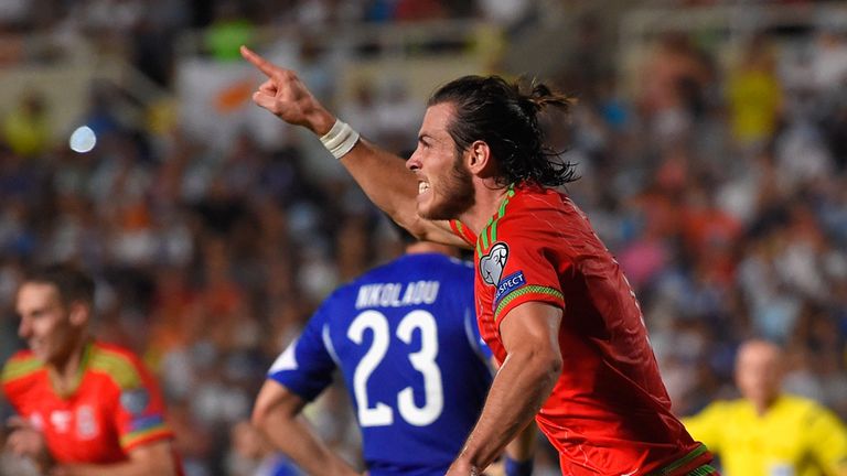 Wales striker Gareth Bale celebrates after scoring the opening goal 