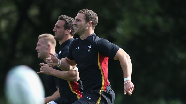 George North (r) leads Sam Warburton (c) and Ross Moriarty in a sprint during a Wales training session