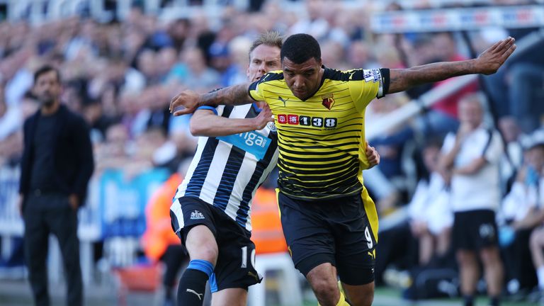 NEWCASTLE UPON TYNE, ENGLAND - SEPTEMBER 19 : Siem De Jong of Newcastle tackles Troy Deeney of Watford during Barclays Premier League match between Newcast