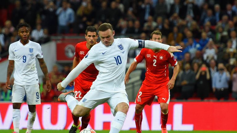 Wayne Rooney scores from the penalty spot against Switzerland to break Sir Bobby Charlton's England goalscoring record at Wembley.