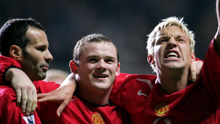 Wayne Rooney of Manchester United celebrates scoring the fourth goal with Ryan Giggs and Alan Smith 2004
