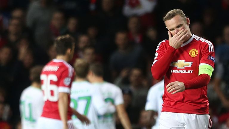 Wayne Rooney of Manchester United reacts to Daniel Caligiuri of Wolfsburg scoring 