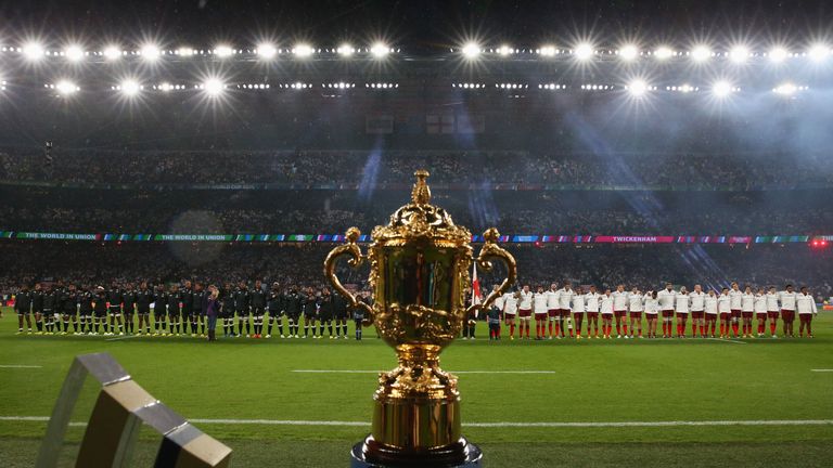 The Webb Ellis Cup is seen as England and Fiji observe the national anthem during the 2015 Rugby World Cup Pool A match at Twickenham