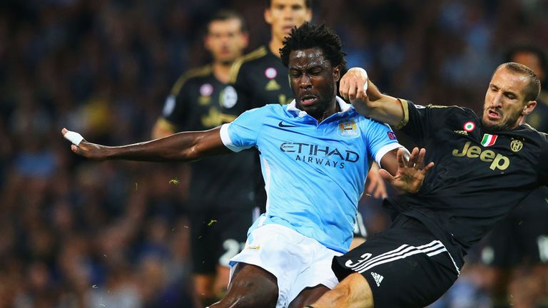 MANCHESTER, ENGLAND - SEPTEMBER 15:  Wilfred Bony of Manchester City is tackled by Giorgio Chiellini of Juventus during the  UEFA Champions League Group D 