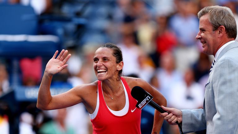 Vinci waves to the Arthur Ashe crowd after defeating Serena Williams to reach her first US Open final