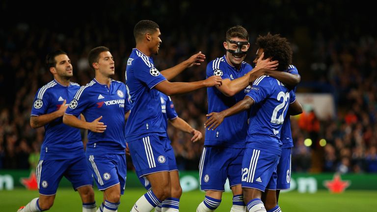 Willian of Chelsea is congratulated by Gary Cahill and Ruben Loftus-Cheek